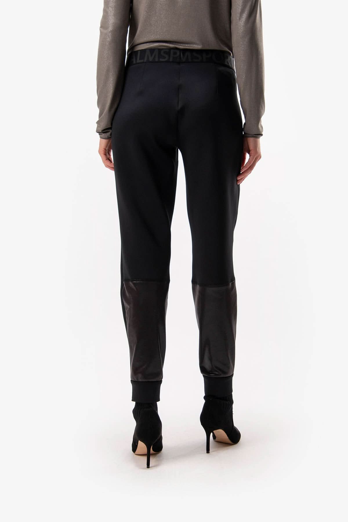 Goran's black joggers