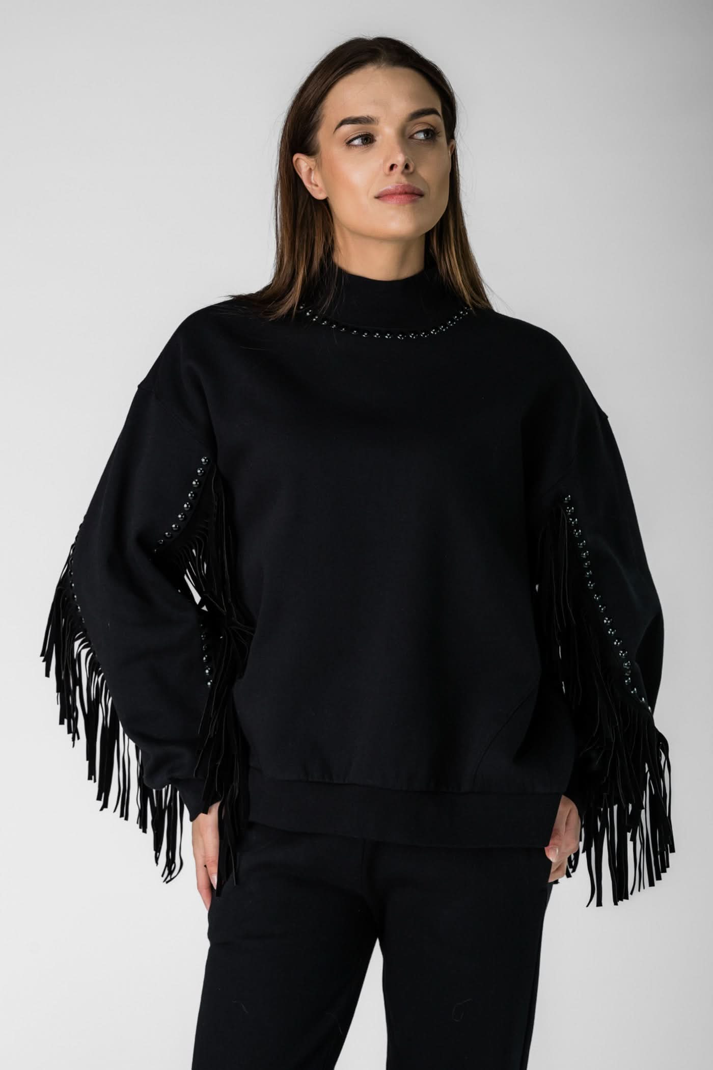 FRENZY crew neck sweater in black with fringes
