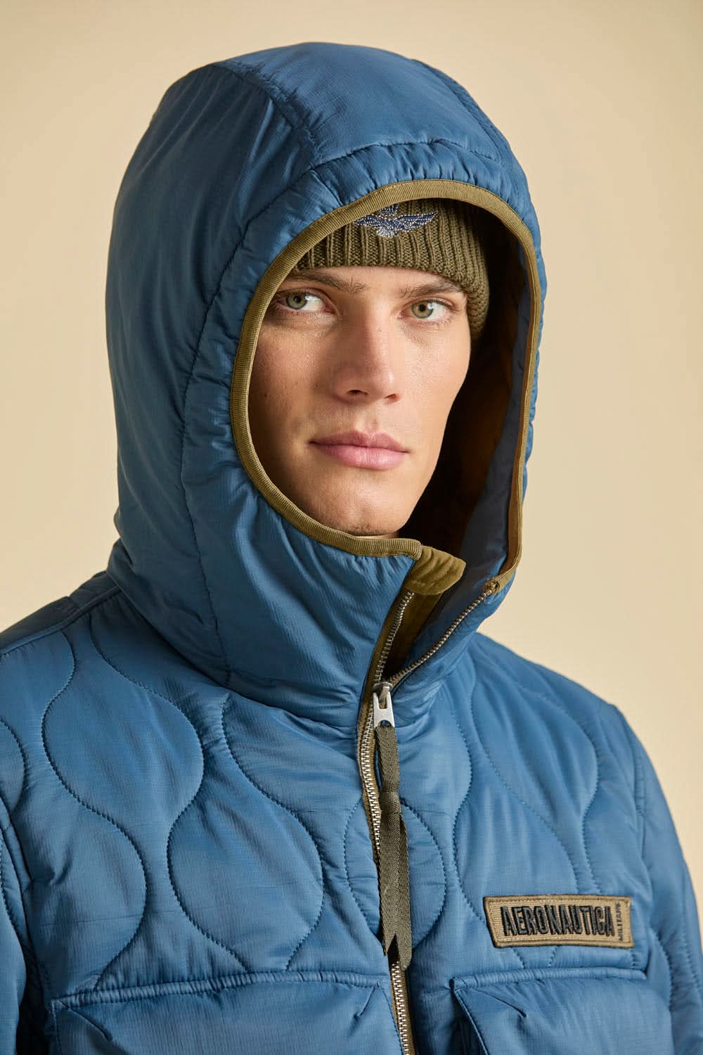 Avio blue quilted jacket with hood