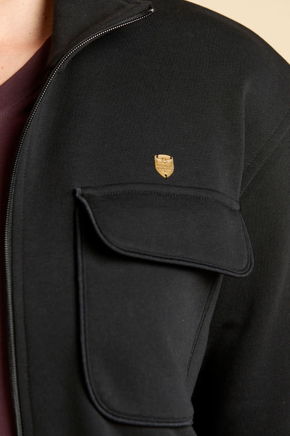 Black zip-up sweatshirt with pocket