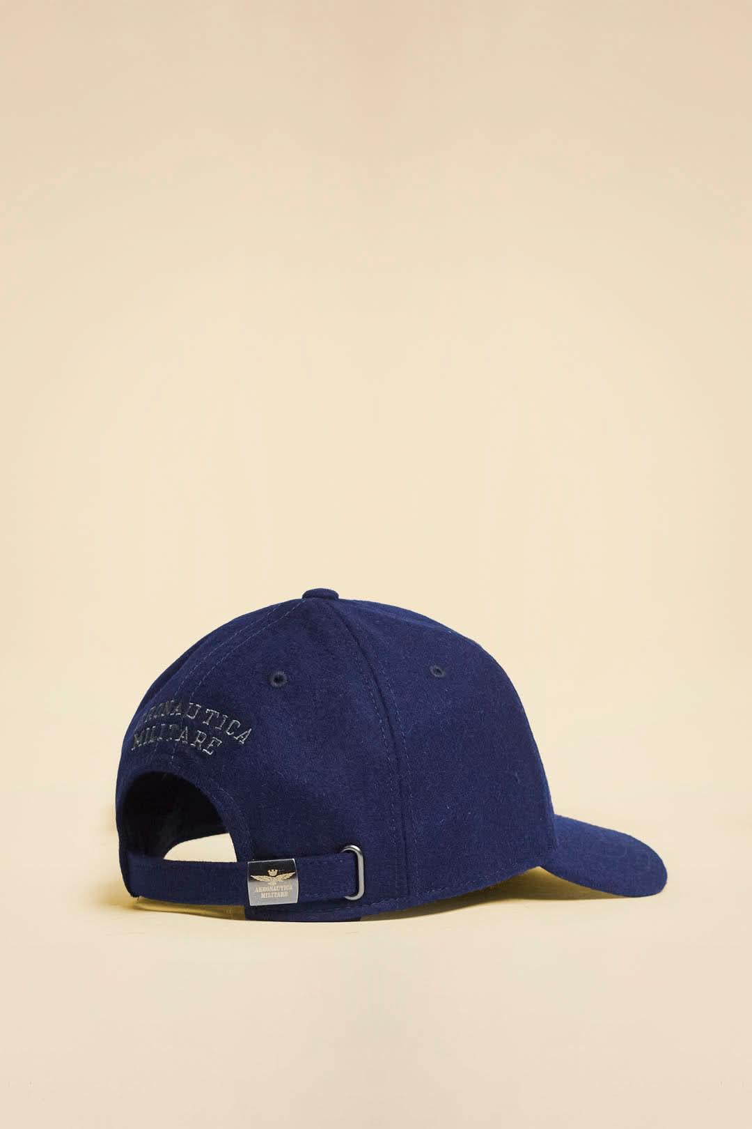 Navy blue with embroidered black eagle