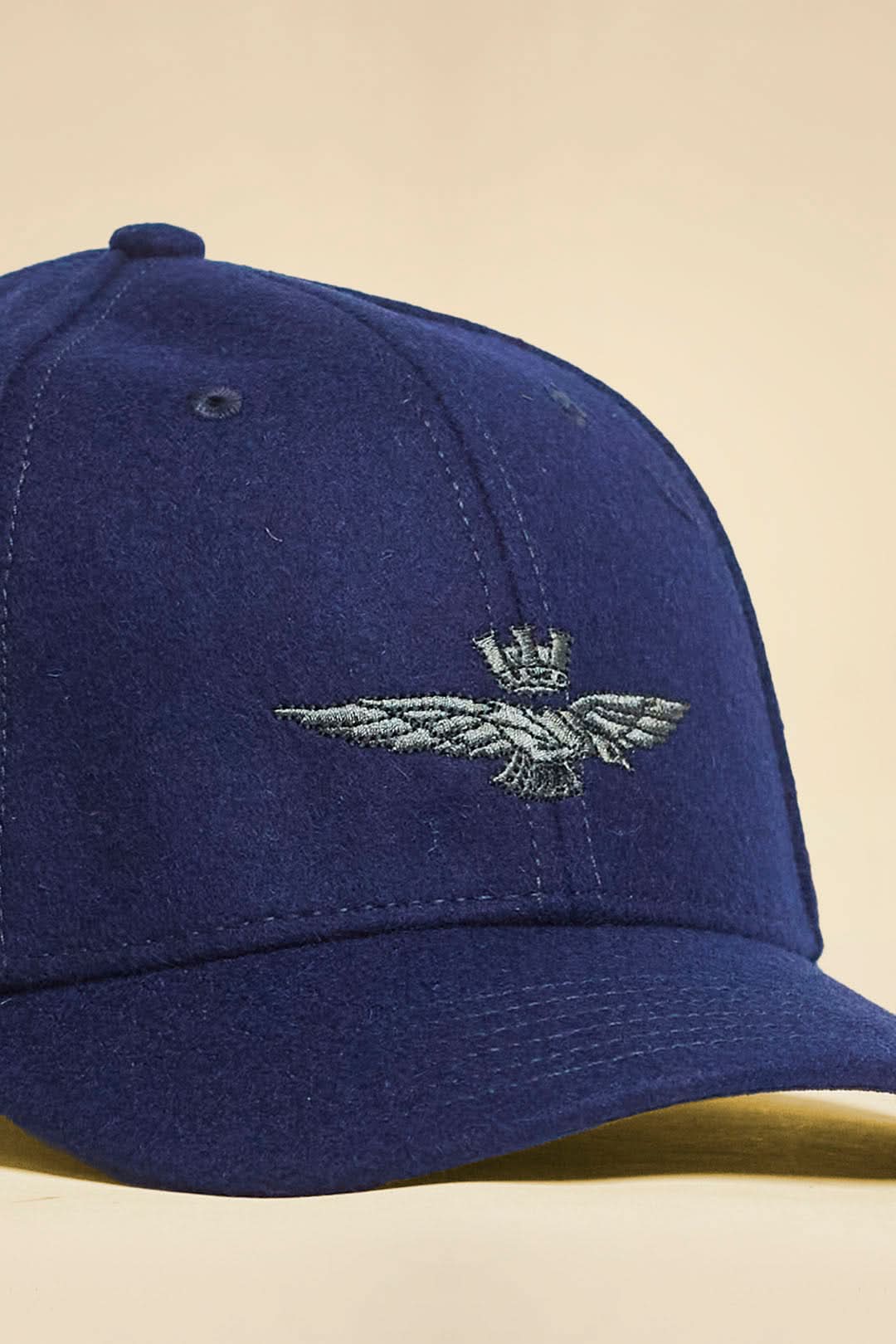 Navy blue with embroidered black eagle