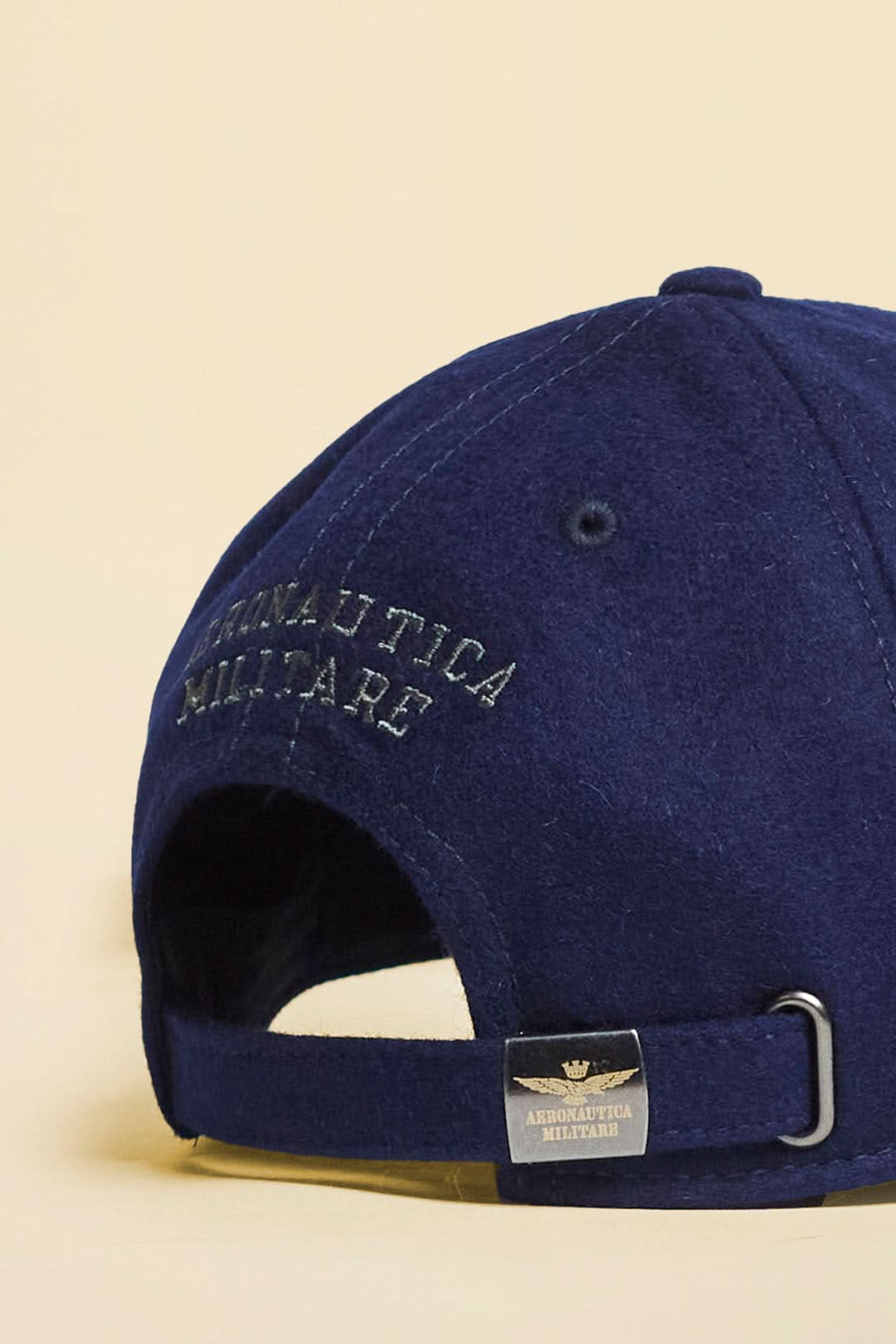 Navy blue with embroidered black eagle