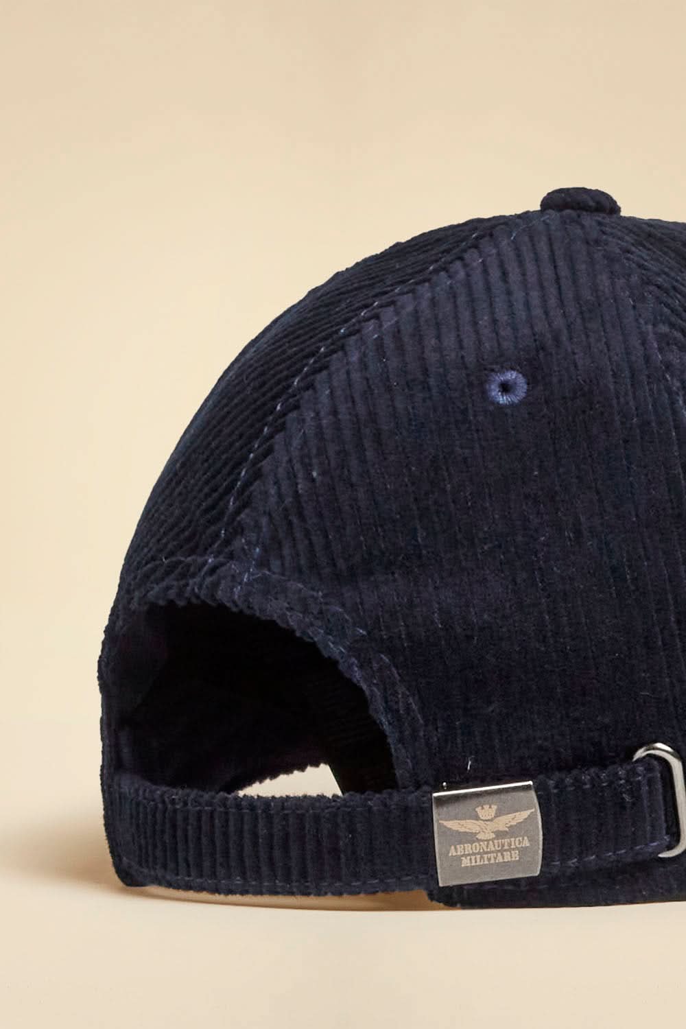 Navy blue ribbed velvet cap with eagle