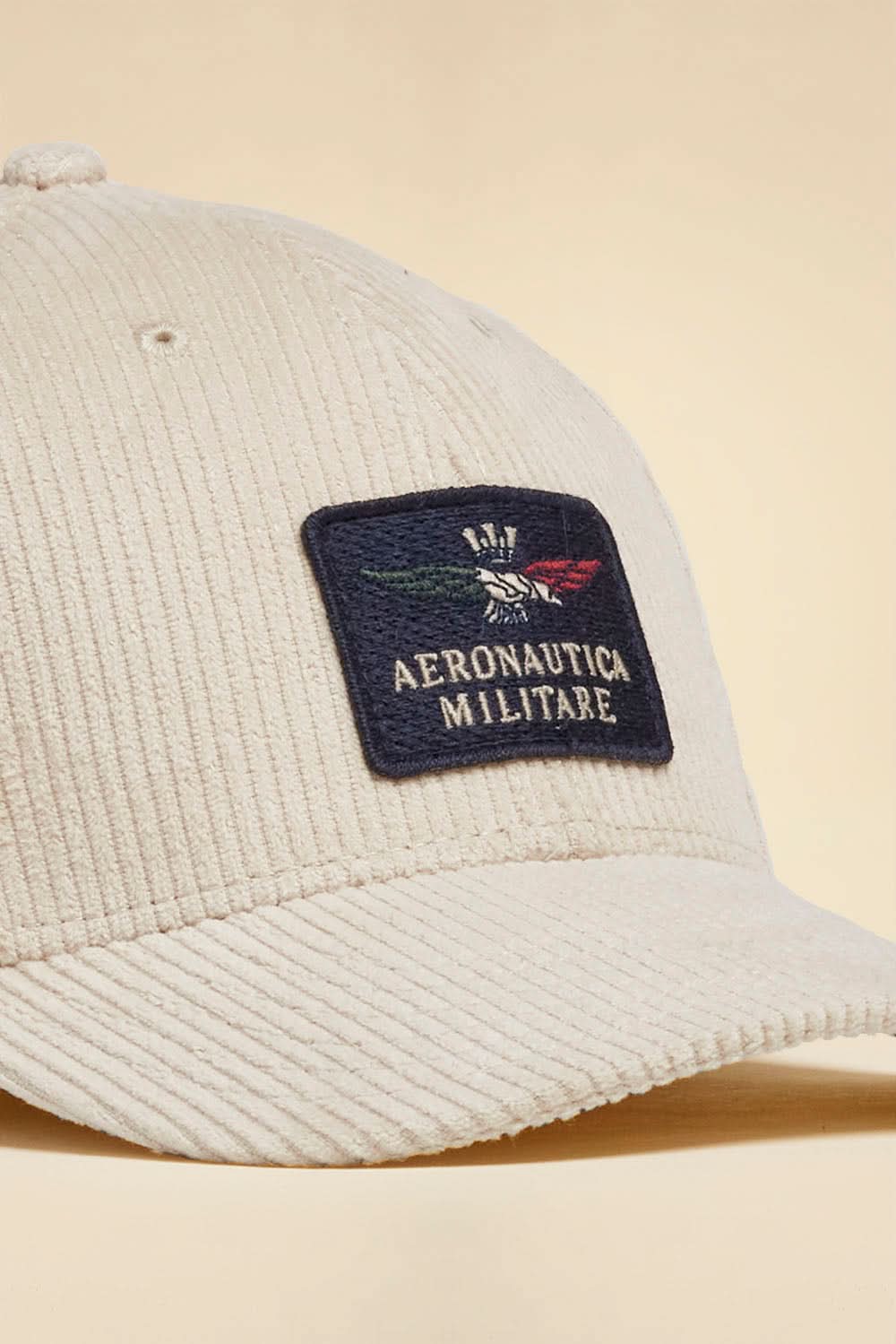 Cream ribbed velvet hat with eagle