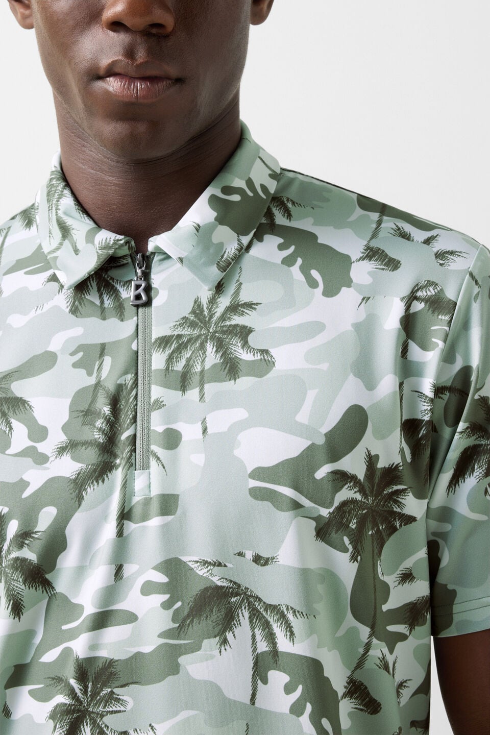 Green TARON functional polo shirt