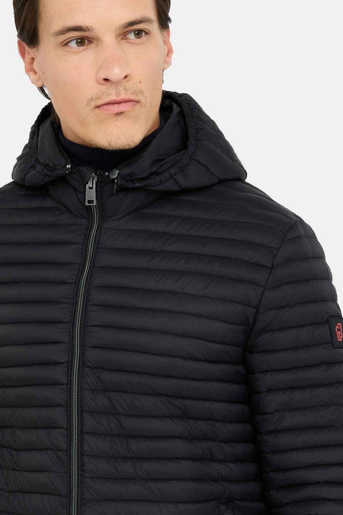 Black quilted jacket