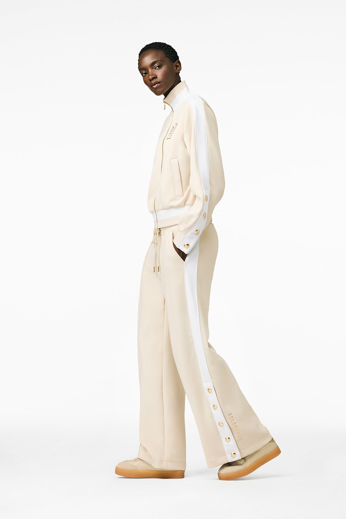 Jasnobeżowe spodnie GRIMAUD track pants