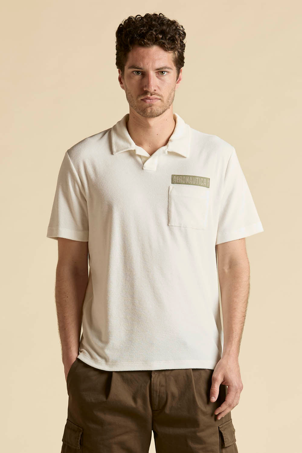 Biała Polo z bawełny frotte z kieszonką